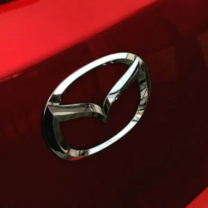 silver Mazda emblem